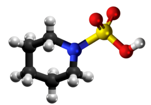 Piperidino-1-sulfonata acido