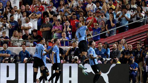 Mathias Olivera of Uruguay took to the sky after scoring the team's goal.