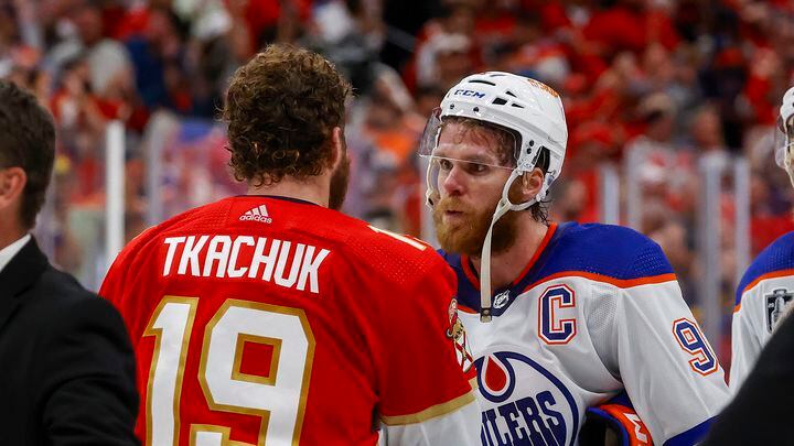 Connor McDavid (right) greeted the Panthers' Matthew Tkachuk on the handshake line following the Oilers' defeat in Game 7 of the Stanley Cup Final.