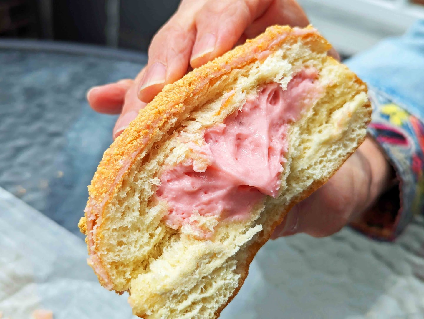 The Somerville Cream at Davis Square Donuts & Bagels is filled with a mixture of Marshmallow Fluff and strawberry cream cheese.