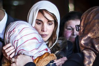 Jordan's Queen Rania offers her condolences to the family of Jordanian pilot Muath al-Kasaesbeh, at their family home of Muath i