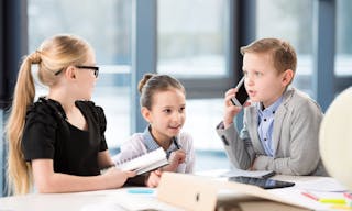 Depositphotos_Children_working_in_office leadership