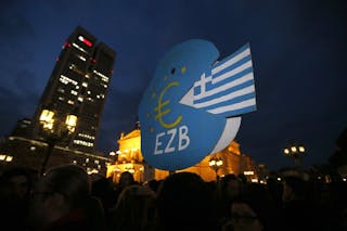 Protesters gather during an anti-capitalist demonstration in Frankfurt