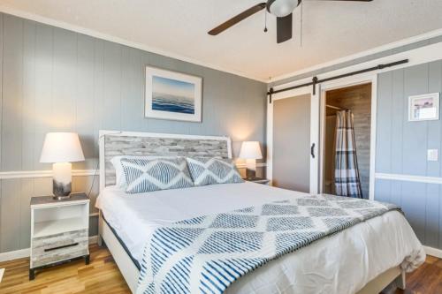 a bedroom with a bed and a ceiling fan at The Beach Is Back in Myrtle Beach