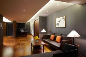 Χώρος καθιστικού στο Oriens Hotel & Residences Myeongdong