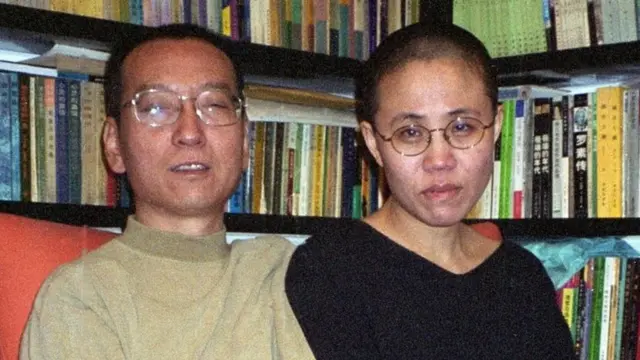 Chinese dissident and Nobel Peace laureate Liu Xiaobo (left) and his wife Liu Xia in Beijing in October 2002