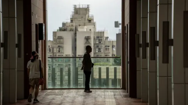 People are waiting for the elevator at the University of Hong Kong in Hong Kong on April 30, 2024.