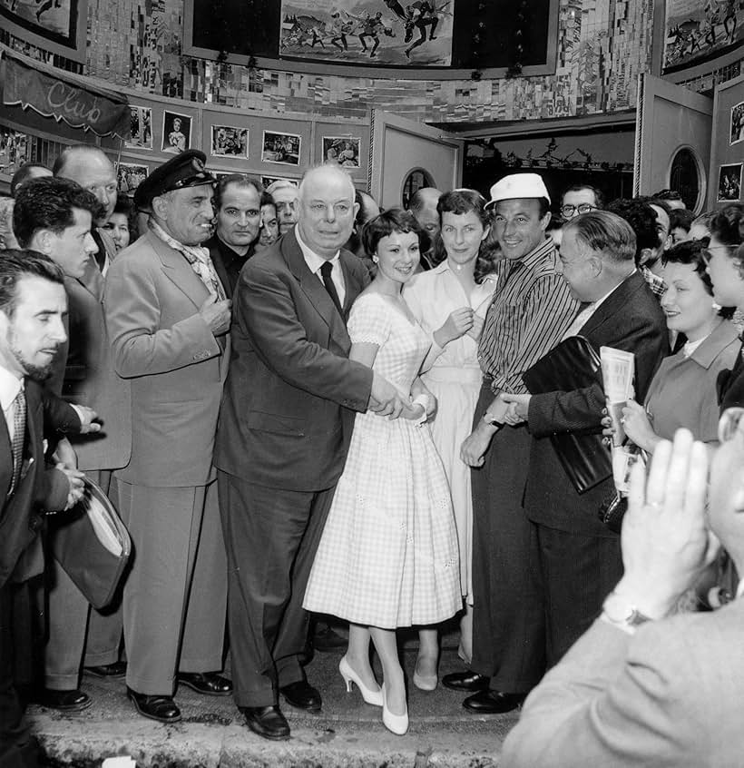 Gene Kelly, Betsy Blair, Jean Renoir, and Charles Vanel