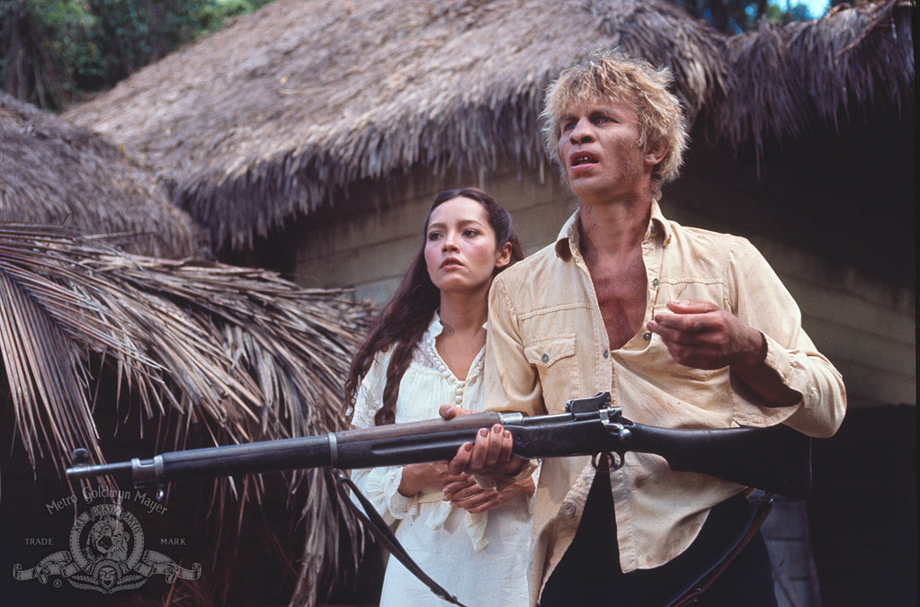 Barbara Carrera and Michael York in The Island of Dr. Moreau (1977)