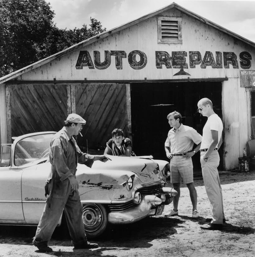 Patrick Dempsey, James Gammon, Arye Gross, and Daniel Stern in Coupe de Ville (1990)