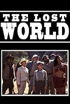 David Warner, Eric McCormack, Tamara Gorski, Darren Peter Mercer, John Rhys-Davies, and Nathania Stanford in The Lost World (1992)