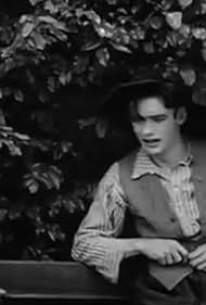 Robert Harron in The Adopted Brother (1913)