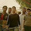 Aamir Khan, Ritvik Sahore, Zaira Wasim, and Suhani Bhatnagar in Dangal (2016)