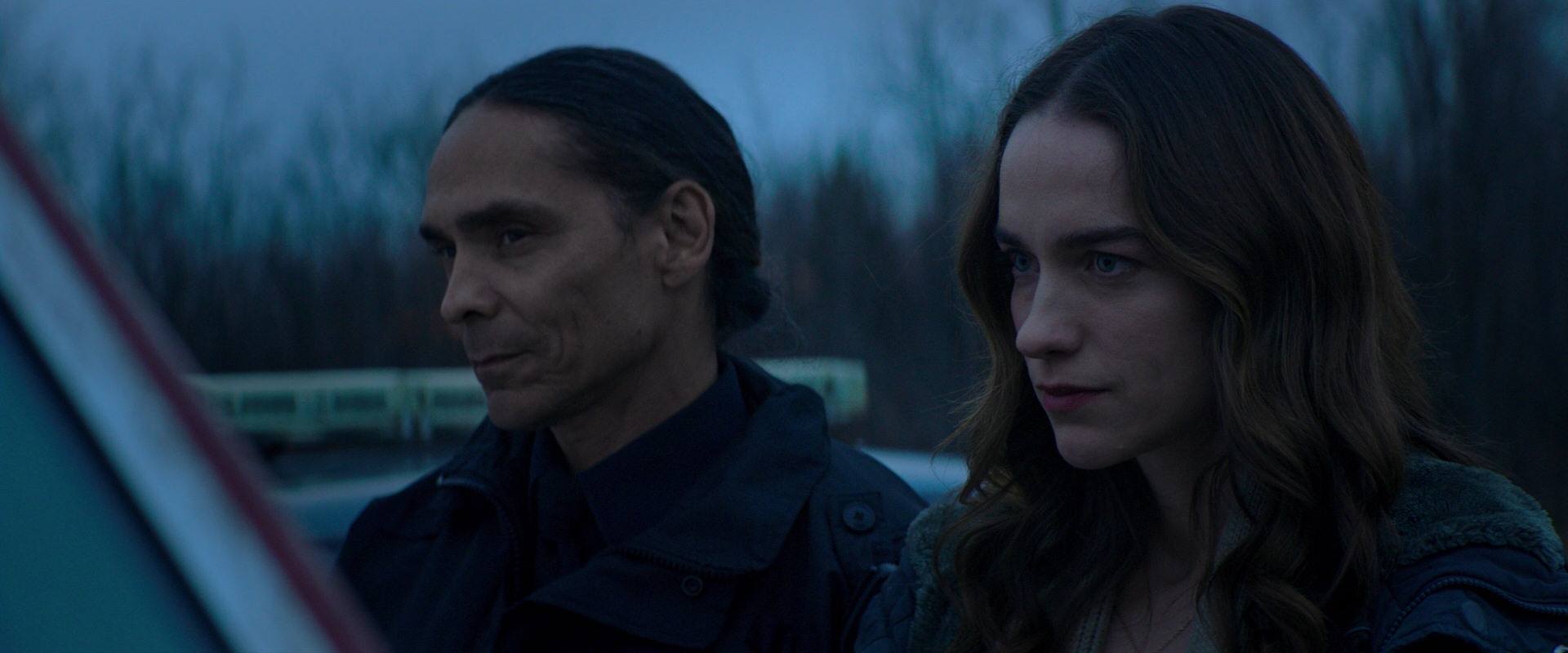 Zahn McClarnon and Melanie Scrofano in The Silencing (2020)