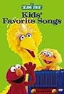 Fran Brill, Kevin Clash, Caroll Spinney, and Big Bird in Kids' Favorite Songs (1999)