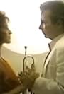 Herb Alpert and Rachel McLish in Herb Alpert: Red Hot (1983)