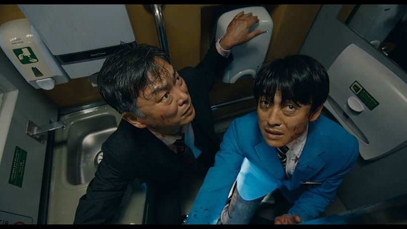 Kim Eui-sung and Seong-soo Han in Train to Busan (2016)