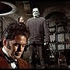 Peter Cushing, Sandor Elès, Kiwi Kingston, and Peter Woodthorpe in The Evil of Frankenstein (1964)