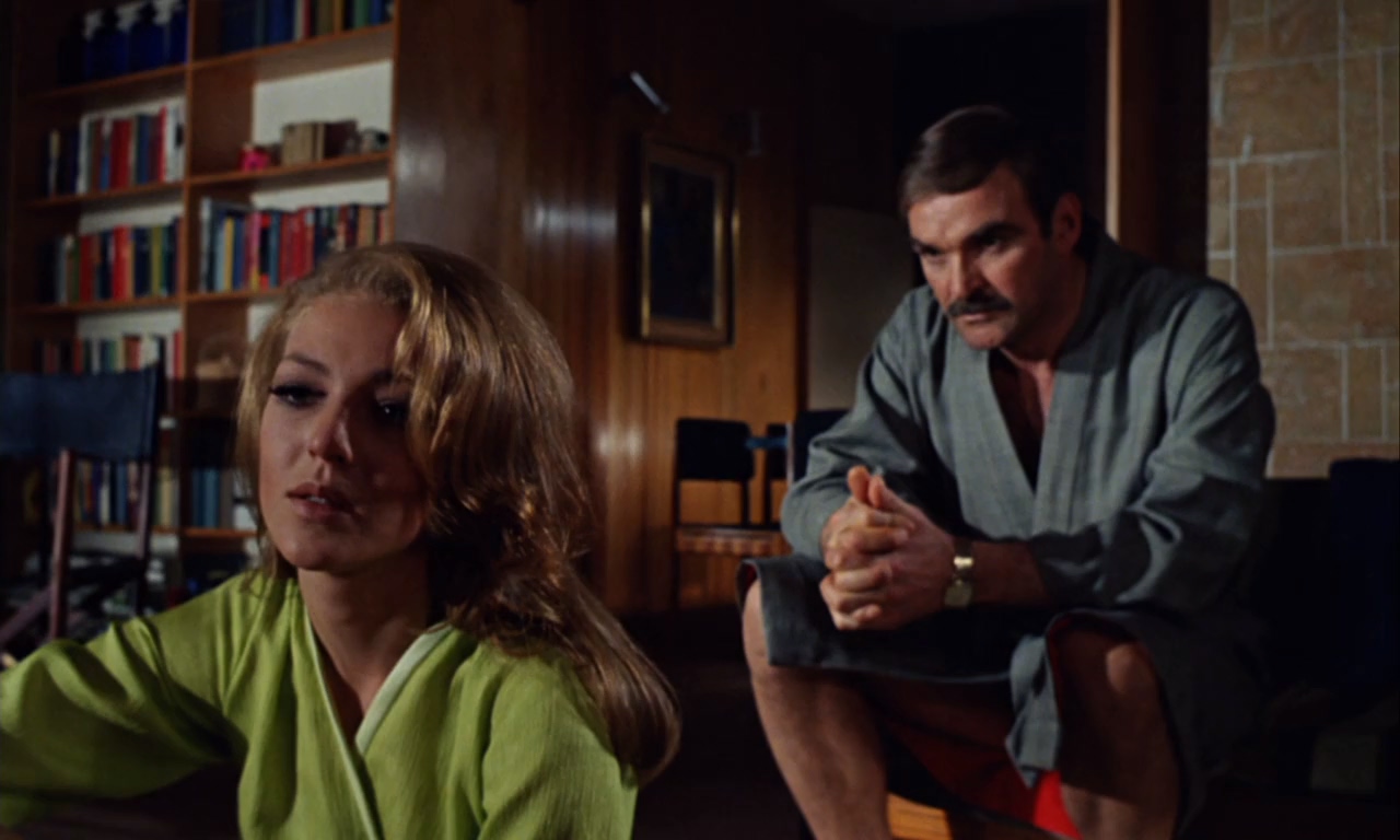 Stanley Baker and Joanna Pettet in Robbery (1967)