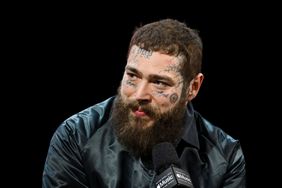 LAS VEGAS, NEVADA - FEBRUARY 08: Post Malone is interviewed during the Super Bowl LVIII Pregame & Apple Music Super Bowl LVIII Halftime Show press conference at the Mandalay Bay Convention Center on February 08, 2024 in Las Vegas, Nevada. 