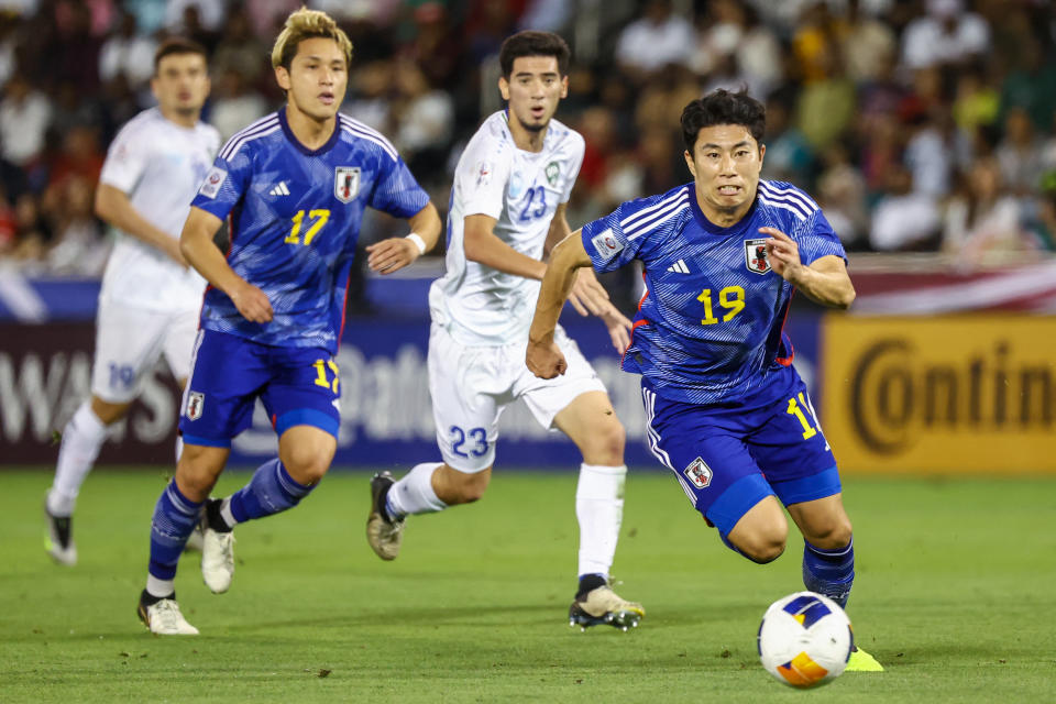 日本在U23足球賽事中對陣烏茲別克。(Photo by KARIM JAAFAR / AFP) (Photo by KARIM JAAFAR/AFP via Getty Images)