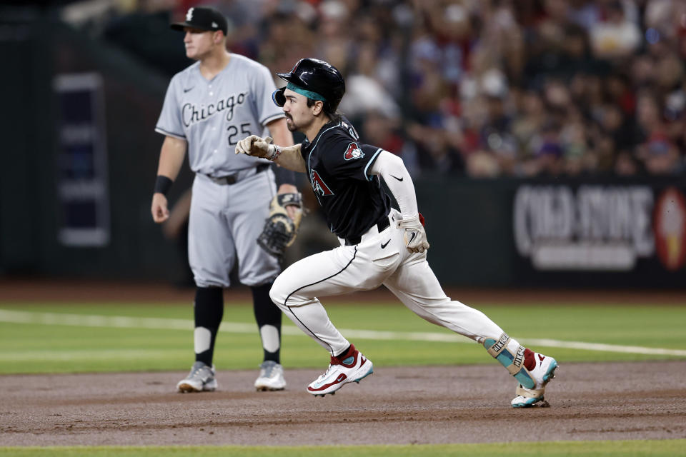PHOENIX, ARIZONA - JUNE 15: Corbin Carroll #7 of the Arizona Diamondbacks runs the bases after hitting a double during the first inning against the Chicago White Sox at Chase Field on June 15, 2024 in Phoenix, Arizona. (Photo by Chris Coduto/Getty Images)