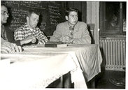 Three Men At The Table (7978063818).jpg