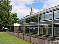 Cheam Library. Here is a lovely library in Cheam, behind which the Steeple of St Dunstan's Church can be seen jutting