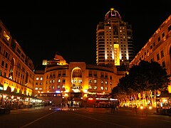 Nelson Mandela Square at night.