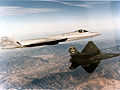 Both Northrop-McDonnell Douglas YF-23s in flight.