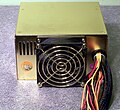 Rear of a gold-colored PSU