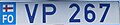 Faroe Islands, as issued since 1996 with the national code FO, the flag and a combination of two leading letters and three numbers behind. Note the deep blue colour of the characters.