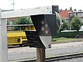 old (bottom, light bulbs) and new (top, LED lights) signal light for train drivers in belgian railway stations