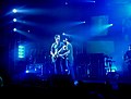 Jonny Greenwood and Ed O'Brien singing during a concert at Blackpool.