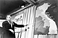 Robert McNamara pointing to map of Vietnam, 1965