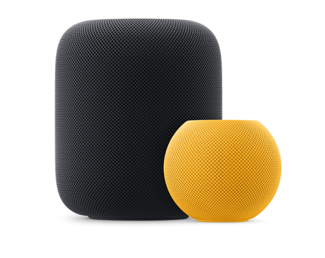 One Midnight HomePod and one Yellow HomePod mini sitting side by side