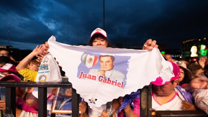 Fans watch "Juan Gabriel: Mis 40 en Bellas Artes" on Sept. 22, 2024 in Zócalo in Mexico City.