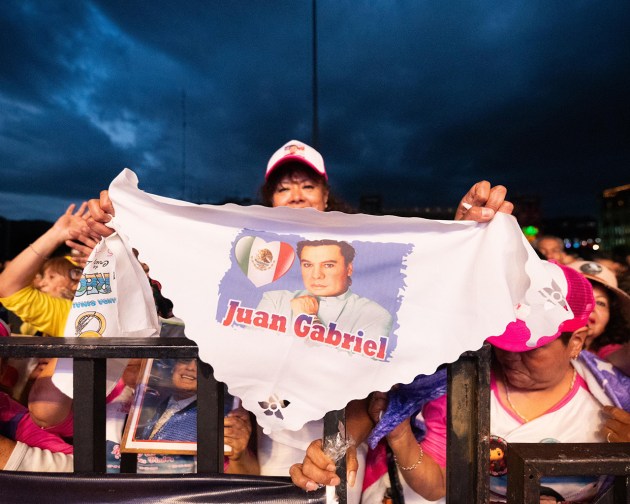 Fans watch "Juan Gabriel: Mis 40 en Bellas Artes" on Sept. 22, 2024 in Zócalo in Mexico City.