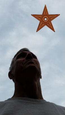 An accidental self-portrait. A friend, who is a Soviet expatriate, said I really needed to put a hammer and sickle on it; so, I added a barnstar.