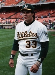 A baseball player in green and white