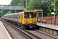 A Merseyrail Class 508 arrives with a service.