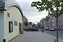 ☎∈ The Orchard Community Centre and houses along Central Avenue in Orchard Park, Cambridge.