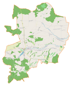 Mapa konturowa gminy Pilica, po lewej znajduje się ikonka zamku z wieżą z opisem „Zamek w Pilicy”