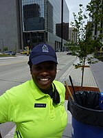 Woman in uniform on Marquette Av downtown