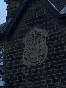 Stanningley Park Lodge Stone Heraldic Crest of Leeds with date of 1894