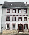 Wohnhaus in geschlossener Bebauung und Hinterhaus