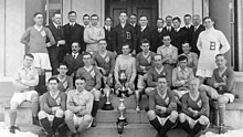 Team photo outside a building