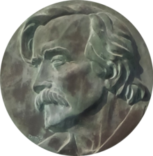 Description de l'image Medalhão com busto de José Rodrigues Miguéis (Cemitério do Alto de São João, Lisboa).png.