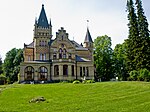 Merlo slott uppfördes 1883-85 av träpatron Fredrik Bünsow