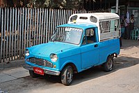 Locally manufactured B360 taxi of Myanmar in the typical blue colour.